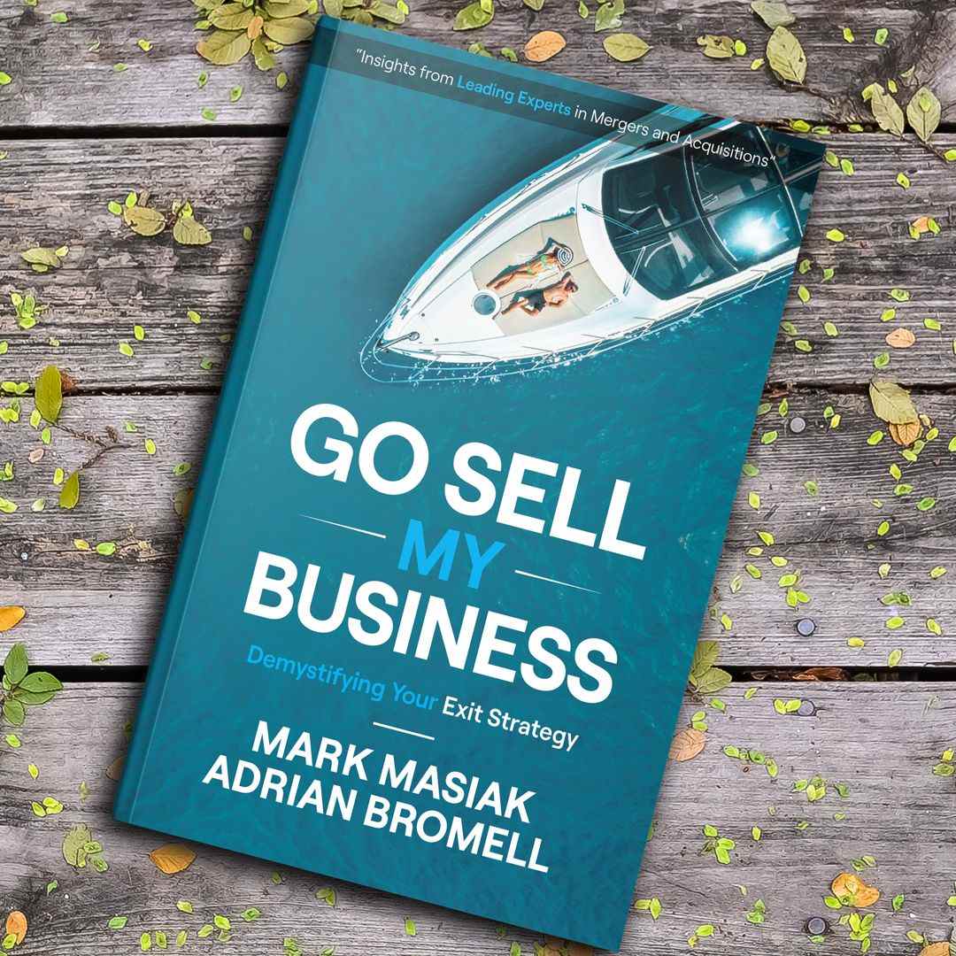 Go Sell My Business book on a working table